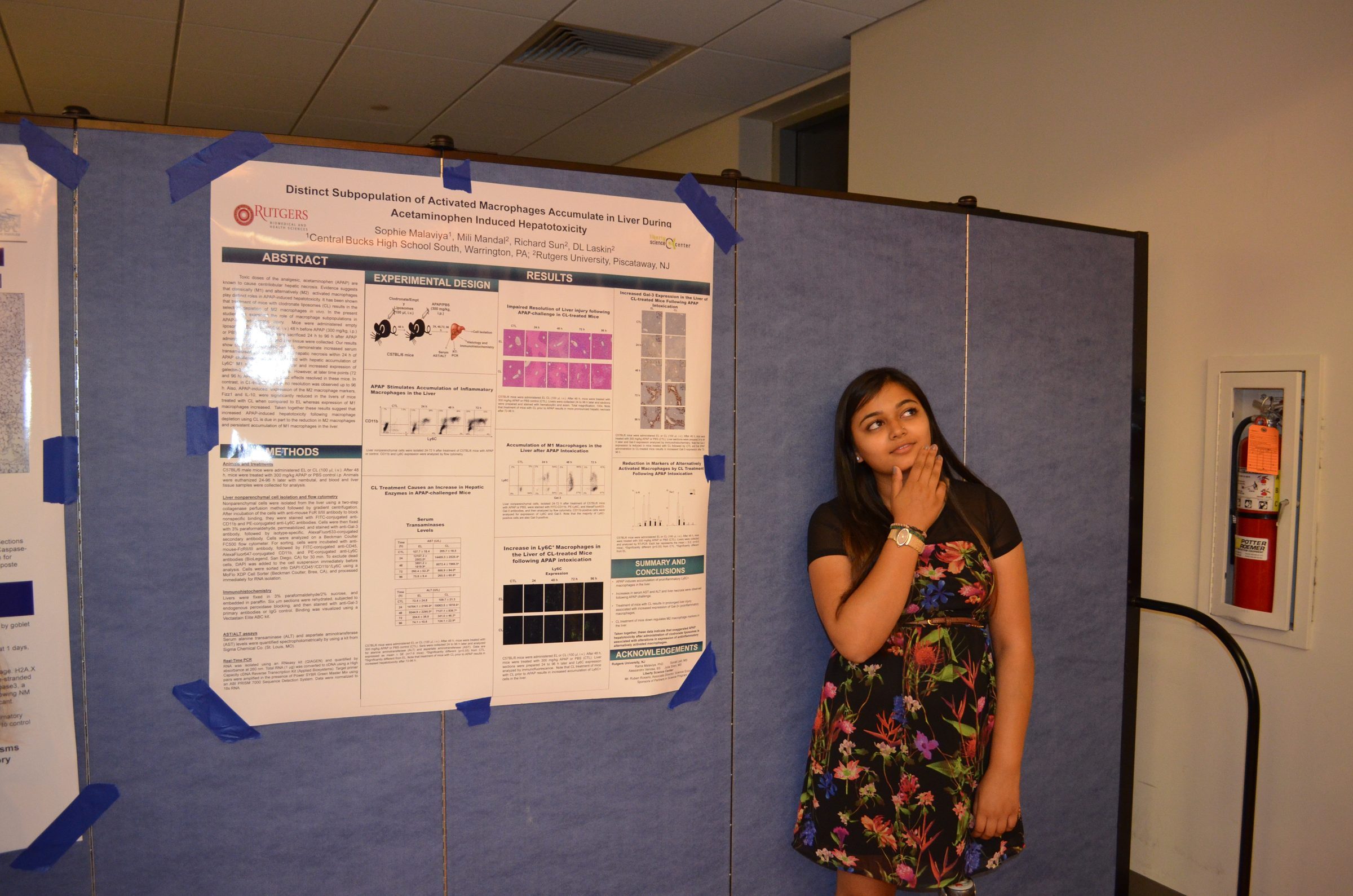 Sophie presenting her research at an academic poster session